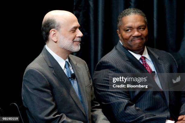 Keith Prewitt, deputy director of the U.S. Secret Service, right, looks at Ben S. Bernanke, chairman of the U.S. Federal Reserve, at the unveiling of...