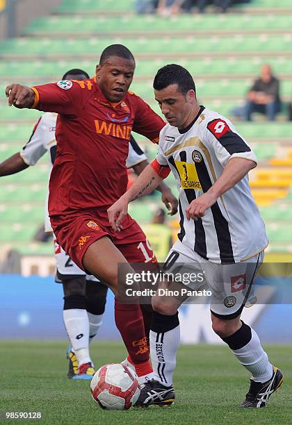 Antonio Di Natale of Udinese competes with Julio Cesar Baptista of Roma during the Tim Cup between Udinese Calcio and AS Roma at Stadio Friuli on...