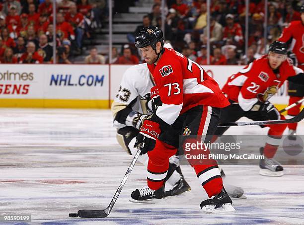 Chris Kelly of the Ottawa Senators plays the puck against the Pittsburgh Penguins during Game 3 of the Eastern Conference Quaterfinals during the...
