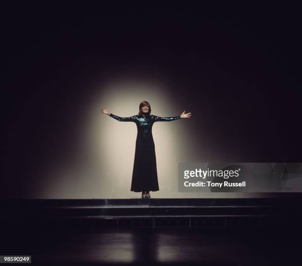Singer Cilla Black performs on a television show circa 1973.