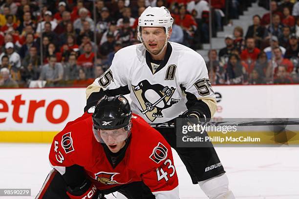 Sergei Gonchar of the Pittsburgh Penguins defends Petter Reign of the Ottawa Senators during Game 3 of the Eastern Conference Quaterfinals during the...