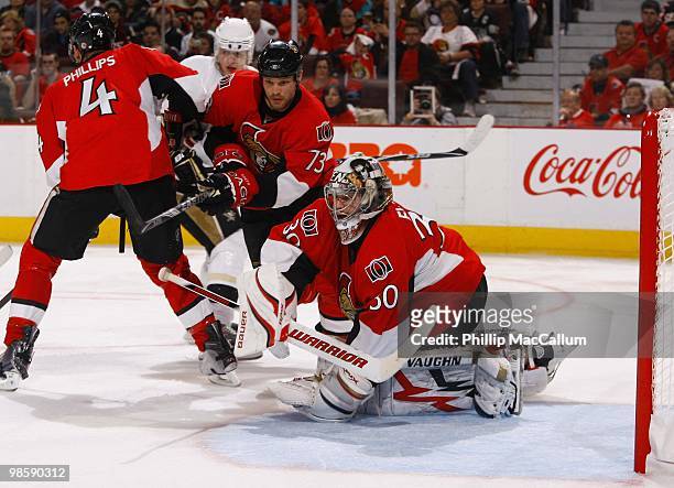 Goaltender Brian Elliott of the Ottawa Senators makes a save against the Pittsburgh Penguins during Game 3 of the Eastern Conference Quaterfinals in...