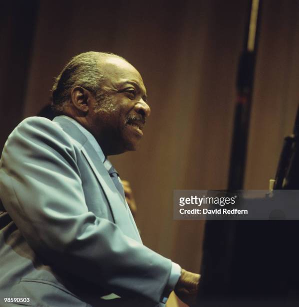 American jazz pianist and composer Count Basie performs live on stage during a performance at the Carnegie Hall as part of the Newport Jazz Festival...
