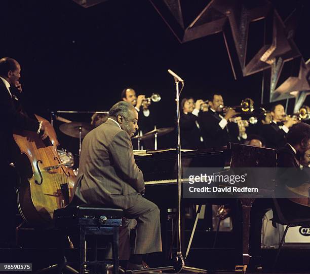 American jazz pianist and composer Count Basie performs live on stage with his Orchestra at the Royal Variety Performance at the Palladium Theatre in...