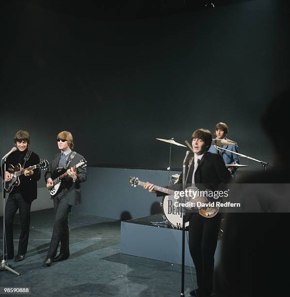 From left, George Harrison , John Lennon , Paul McCartney and Ringo Starr of English rock and pop group The Beatles perform together on stage for the...