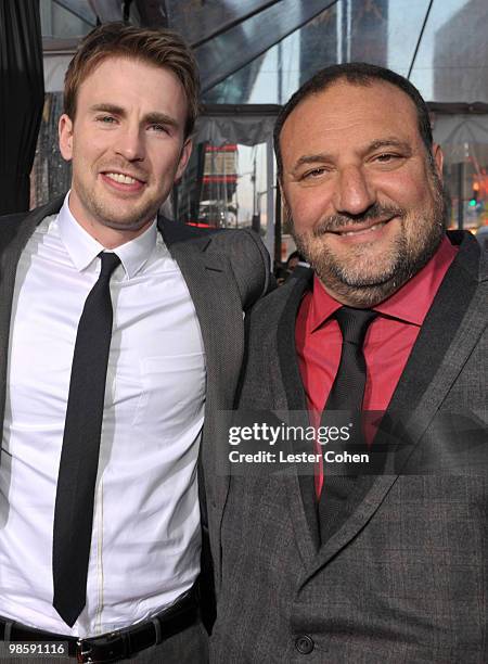 Actor Chris Evans and producer Joel Silver arrive at "The Losers" Premiere at Grauman�s Chinese Theatre on April 20, 2010 in Hollywood, California.