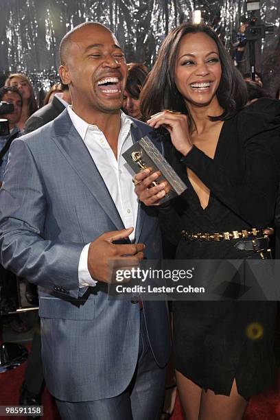 Actor Columbus Short and actress Zoe Saldana arrive at "The Losers" Premiere at Grauman�s Chinese Theatre on April 20, 2010 in Hollywood, California.