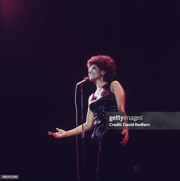 Welsh singer Shirley Bassey performs live on stage at the Royal Albert Hall in London, England in 1976.