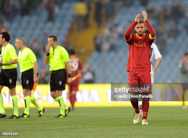 Daniele De Rossi of Roma applaud the fans at the end the Tim Cup between Udinese Calcio and AS Roma at Stadio Friuli on April 21, 2010 in Udine,...
