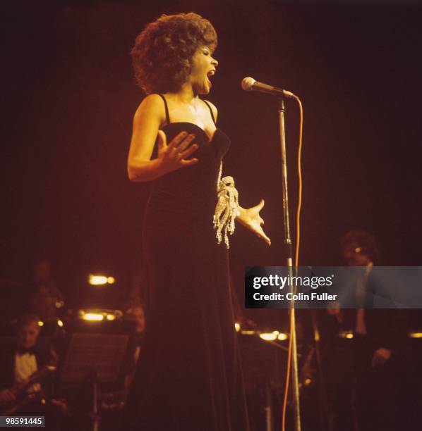 Welsh singer Shirley Bassey performs on stage at the Royal Albert Hall in London, England in October 1974.