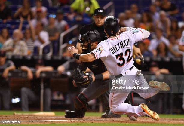 Derek Dietrich of the Miami Marlins in action during the game against the Arizona Diamondbacks at Marlins Park on June 25, 2018 in Miami, Florida.