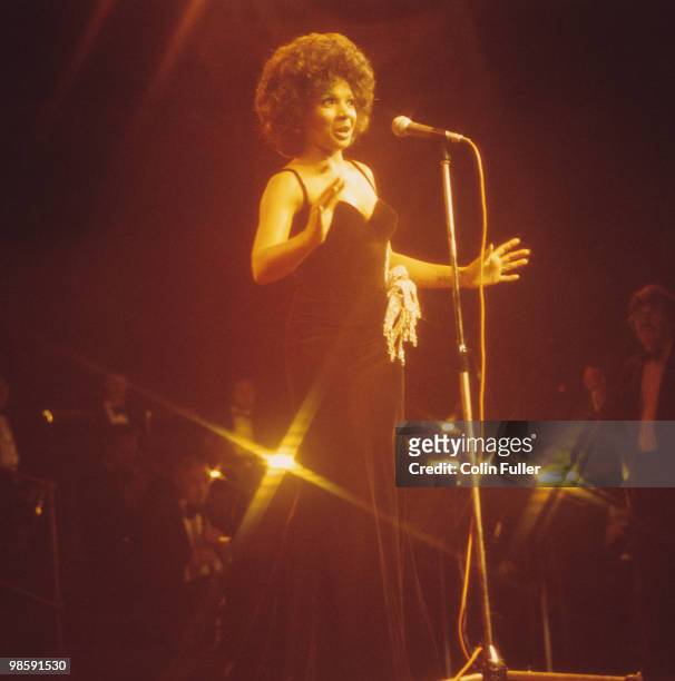 Welsh singer Shirley Bassey performs on stage at the Royal Albert Hall in London, England in October 1974.