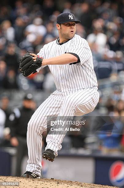 Joba Chamberlain of The New York Yankees in action against the Texas Rangers during their game on April 17, 2010 at Yankee Stadium in the Bronx...
