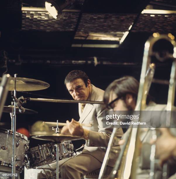 American jazz drummer Buddy Rich performs live on stage playing his drum kit at Ronnie Scott's Jazz Club in Soho, London on 9th November 1969.