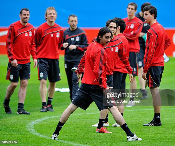 Alberto Aquilani and Yossi Benayoun of Liverpool attend a training session ahead of the UEFA Europa League semi-final first leg match against...