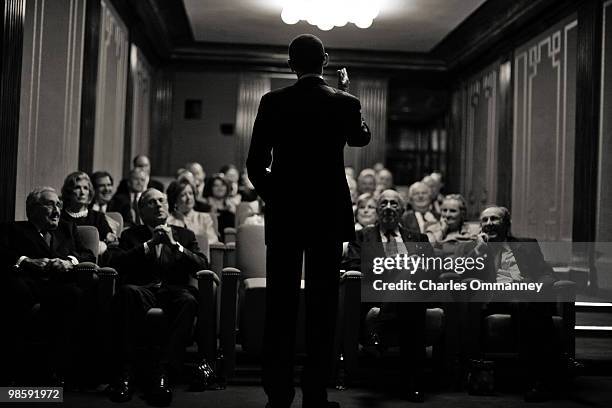 President Barack Obama behind the scenes at the White House in Washington, DC, on April 6, 2010. The president introduces a movie to guests,...
