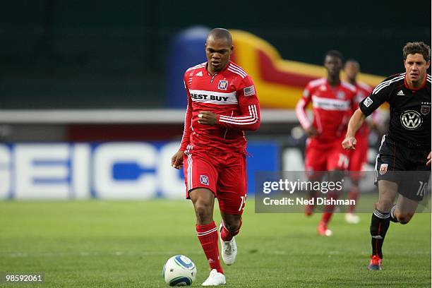 Collins John of the Chicago Fire dribbles against Devon McTavish of D.C. United at RFK Stadium on April 17, 2010 in Washington, DC. The Fire won 2-0.