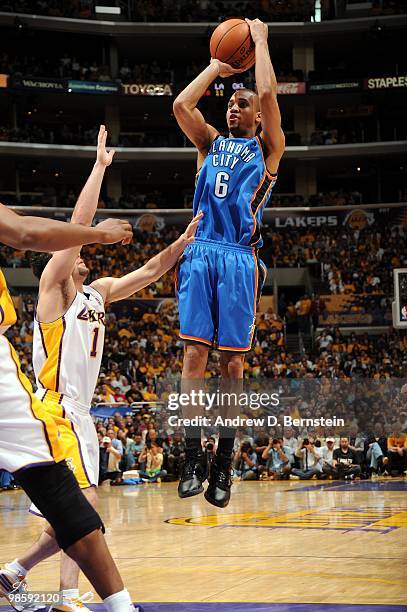 Eric Maynor of the Oklahoma City Thunder shoots a jump shot against Jordan Farmar of the Los Angeles Lakers in Game One of the Western Conference...