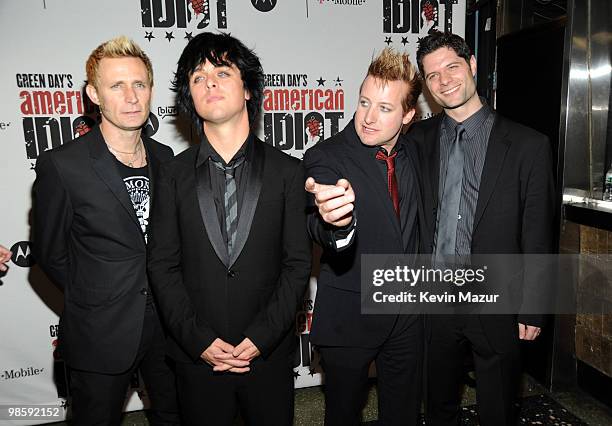 Mike Dirnt, Billie Joe Armstrong and Tre Cool of Green Day with arranger/orchestrator Tom Kitt attend the after party for the opening of "American...