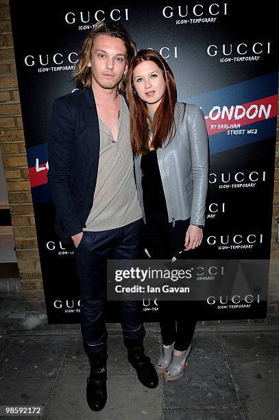 Jamie Campbell Bower and Bonnie Wright attend the Gucci Icon Temporary store opening on April 21, 2010 in London, England.