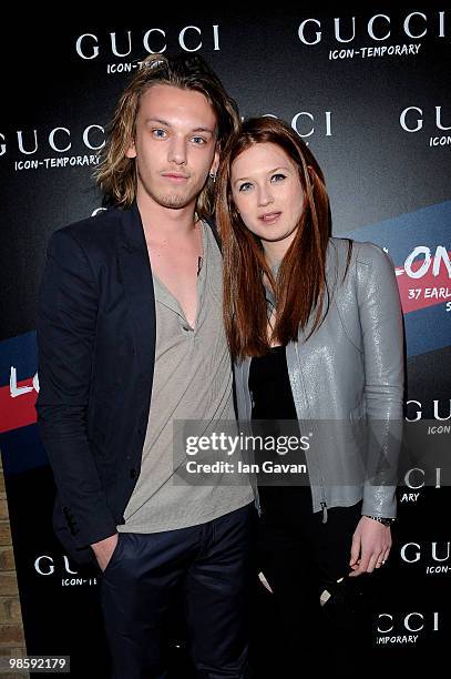 Jamie Campbell Bower and Bonnie Wright attend the Gucci Icon Temporary store opening on April 21, 2010 in London, England.