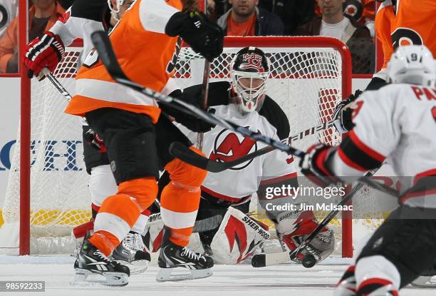 Martin Brodeur of the New Jersey Devils makes a save against the Philadelphia Flyers in Game Four of the Eastern Conference Quarterfinals during the...