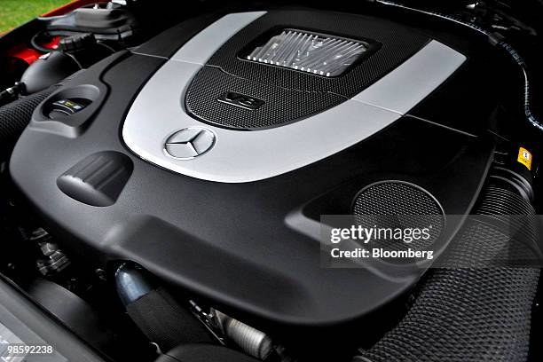 The 5.5-liter V-8 engine of Daimler AG's 2011 Mercedes-Benz E550 Cabriolet is photographed in Great Smoky Mountains National Park near Knoxville,...