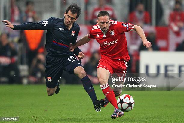 Cesar Delgado of Olympic battles for the ball with Franck Ribery of Bayern during the UEFA Champions League semi final first leg match between FC...