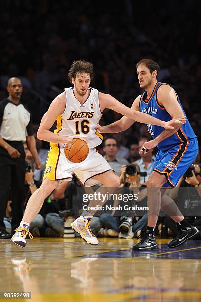 Pau Gasol of the Los Angeles Lakers make a move to the basket against Nenad Krstic of the Oklahoma City Thunder in Game One of the Western Conference...