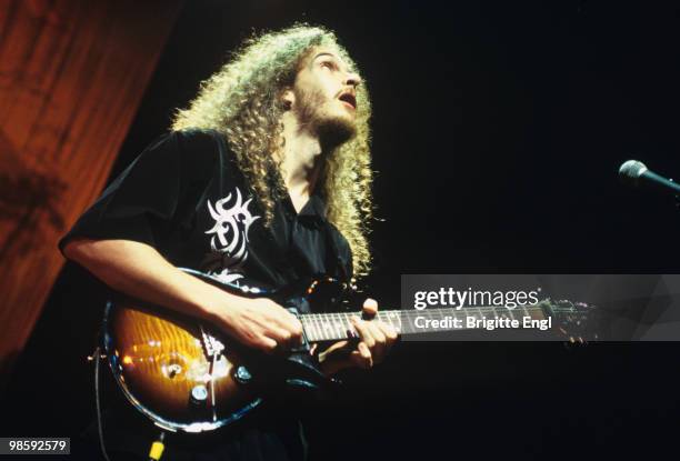 Guthrie Govan of Asia performs on stage at the Shepherd's Bush Empire in London, England on November 30, 2002.