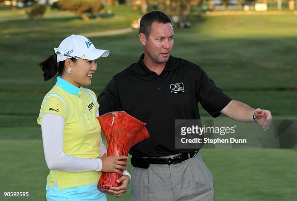 Hee Kyung Seo of South Korea holdsthe trophy with LPGA commisioner Michael Whan after the final round of the Kia Classic Presented by J Golf at La...