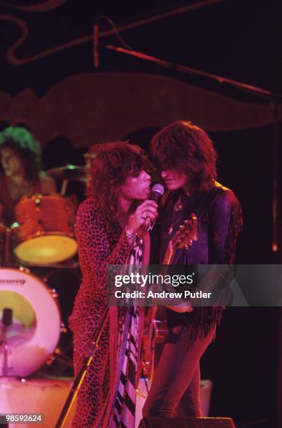 Singer Steven Tyler and guitarist Joe Perry of Aerosmith perform on stage at the Hammersmith Odeon in London, England on October 16, 1976.