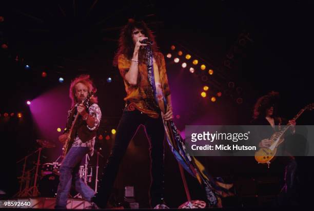 Brad Whitford, Steven Tyler and Joe Perry of Aerosmith perform on stage at Wembley Arena in London, England on December 07, 1993.