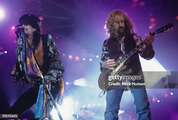 Singer Steven Tyler and guitarist Brad Whitford of Aerosmith perform on stage at Wembley Arena in London, England in December 07, 1993.