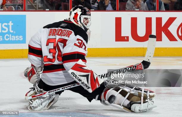 Martin Brodeur of the New Jersey Devils makes a save against the Philadelphia Flyers in Game Four of the Eastern Conference Quarterfinals during the...