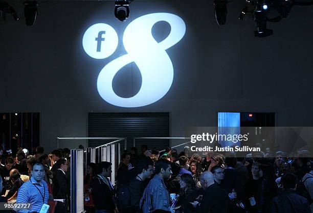 Attendees mingle at the Facebook f8 Developers Conference April 21, 2010 in San Francisco, California. Facebook founder and CEO Mark Zuckerberg...