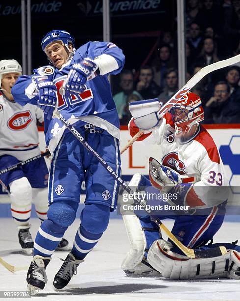 Alexei Gusarov of the Quebec Nordiques skates against the Montreal Canadiens in the 1990's at the Montreal Forum in Montreal, Quebec, Canada.