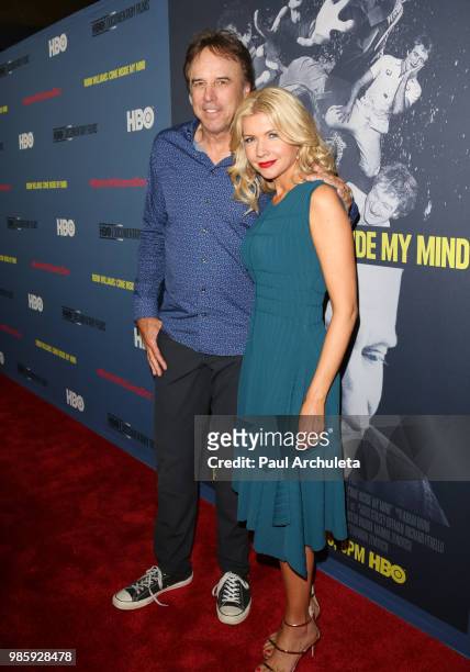 Actors Kevin Nealon and Susan Yeagley attend the premiere of "Robin Williams: Come Inside My Mind" from HBO Documentary Films' at the TCL Chinese...