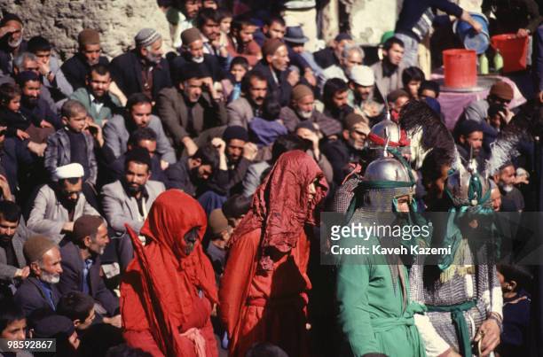 Men dressed as the enemies of Imam Hussein during Ta'zieh on The Day of Ashura in a village near Qom. Ta'zieh means Condolence Theater in which the...