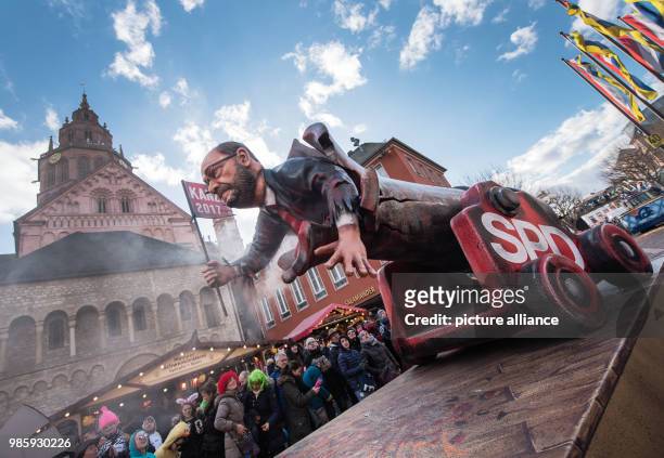 Political caricature float featuring a figure of Martin Schulz under the motto 'Rohr-Krepierer' takes part in the Rosenmontag carnival procession...