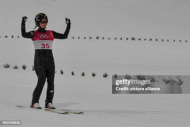 Norway's Maren Lundby celebrates winning the gold medal in the Women's Normal Hill Individual Ski Jumping competition on day three of the PyeongChang...