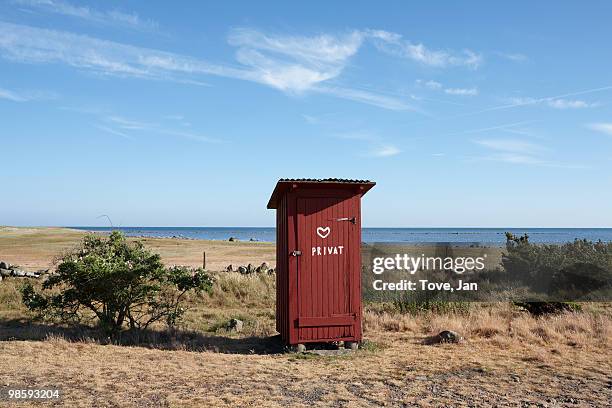 an outhouse on a beach by the sea, sweden. - halland stock pictures, royalty-free photos & images