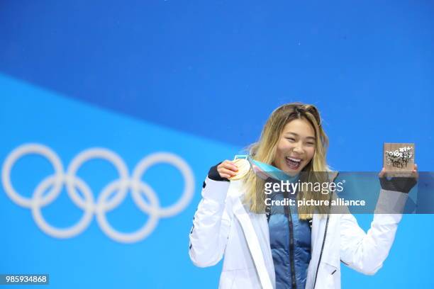 American snowboarder Chloe Kim celebrates winning a gold medal at the Winter Olympics in Pyeongchang, South Korea, 13 February 2018. Photo: Michael...