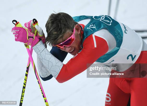 Norway's Johannes Hoesflot Klaebo reacts to his victory at the men's cross-country skiing classic sprint at the Alpensia Centre in Pyeongchang, South...