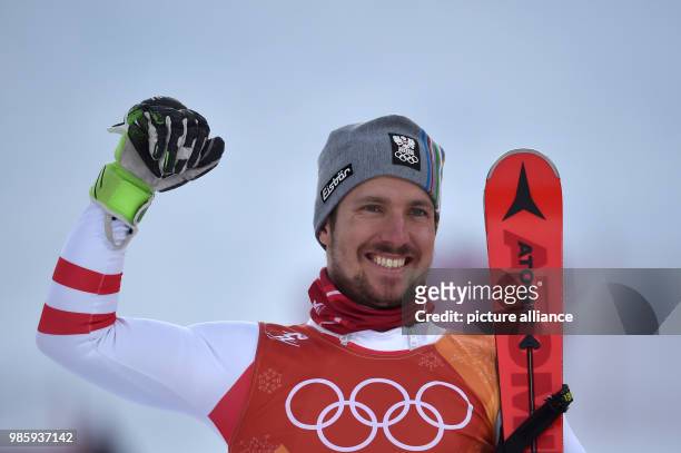 Dpatop - Austria's Marcel Hirscher celebrates winning the Men's combined alpine skiing event on day four of the Pyeongchang 2018 Winter Olympics...