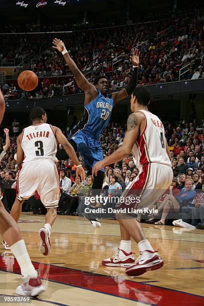 Mickael Pietrus of the Orlando Magic tries for the ball during the game against the Cleveland Cavaliers on April 11, 2010 at Quicken Loans Arena in...