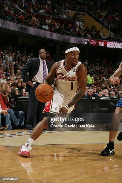 Daniel Gibson of the Cleveland Cavaliers dribble drives to the basket against the Orlando Magic during the game on April 11, 2010 at Quicken Loans...