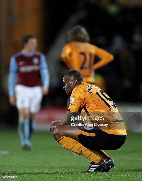 Steven Mouyokolo of Hull City looks dejected after defeat to Aston Villa in the Barclays Premier League match between Hull City and Aston Villa at...