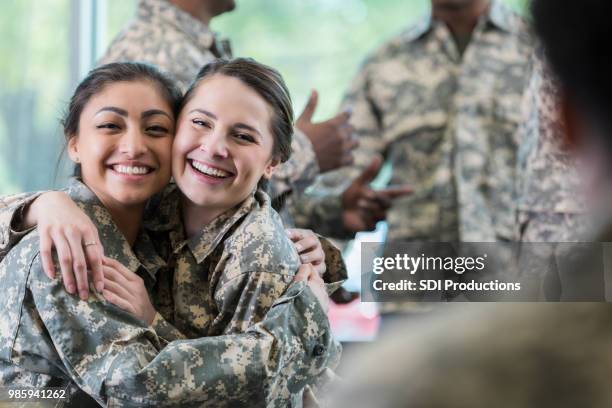 young female soliders - military courage stock pictures, royalty-free photos & images