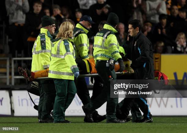 Jan Vennegoor of Hesselink of Hull City is stretchered off the pitch injured during the Barclays Premier League match between Hull City and Aston...